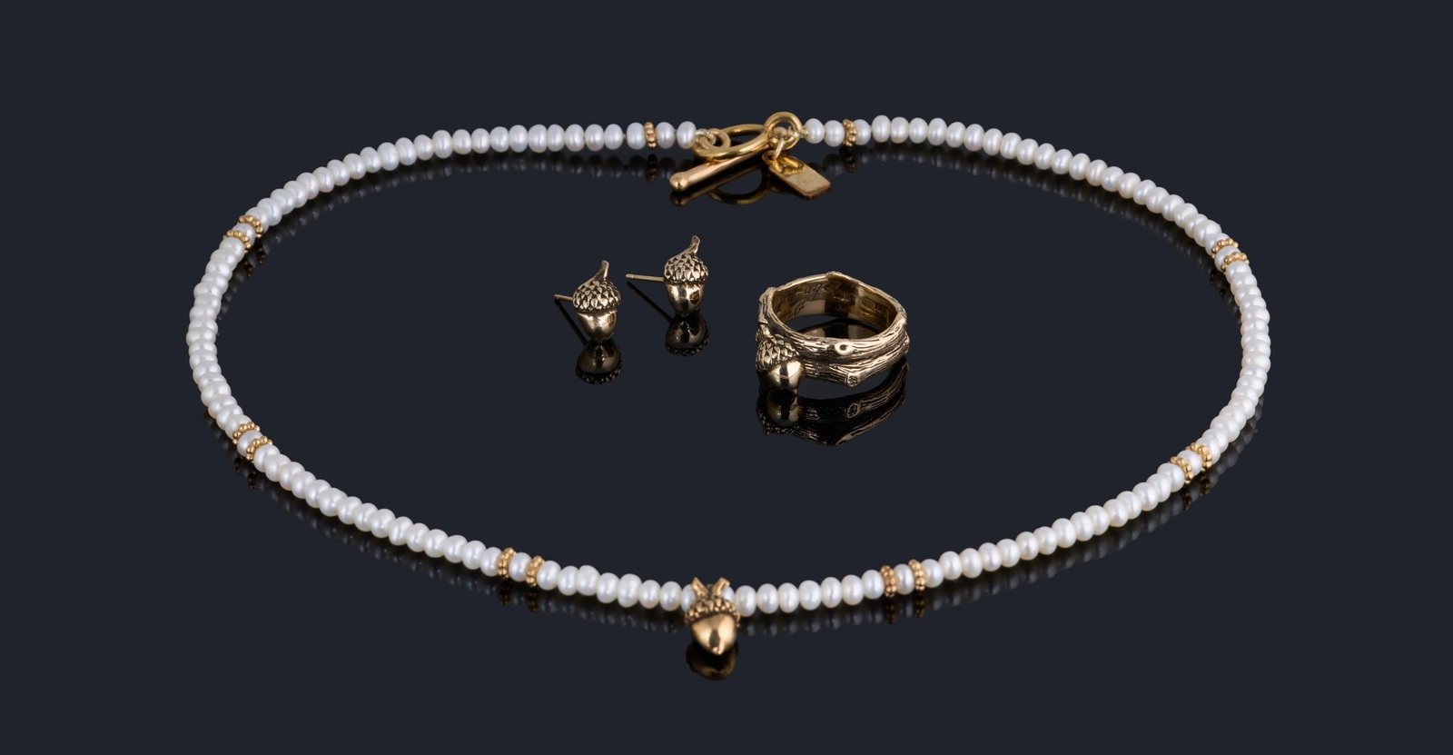 Four Piece 14K Yellow Gold Mignon Faget "Newcomb" Series Jewelry Set, App. Total Wt.- 23.6 grams;: Four Piece 14K Yellow Gold Mignon Faget "Newcomb" Series Jewelry Set, comprising a pearl necklace with gold hardware and acorn pendant, a ring, and a pair of acorn form stud earrings, App. Total Wt.- 