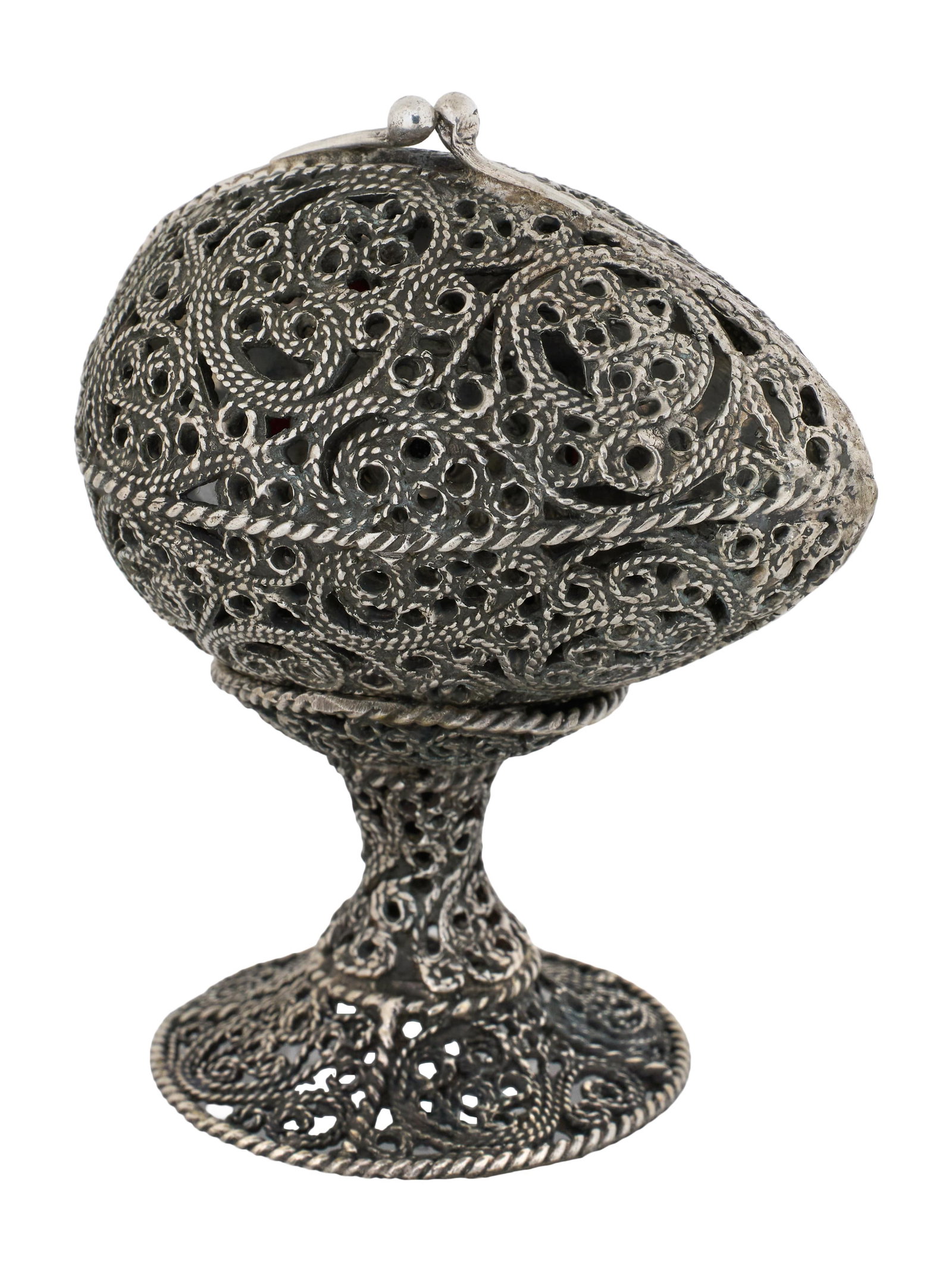Russian Silver Decorative Egg with Stand, 1894, Egg- H.- 2 in., W.- 2 3/4 in., D.- 2 in.; App. Total: Russian Silver Decorative Egg with Stand, 1894, the silver interior mounted with cabochon coral and onyx with a relief star of David, hallmarked on the interior, Egg- H.- 2 in., W.- 2 3/4 in., D.- 2 i