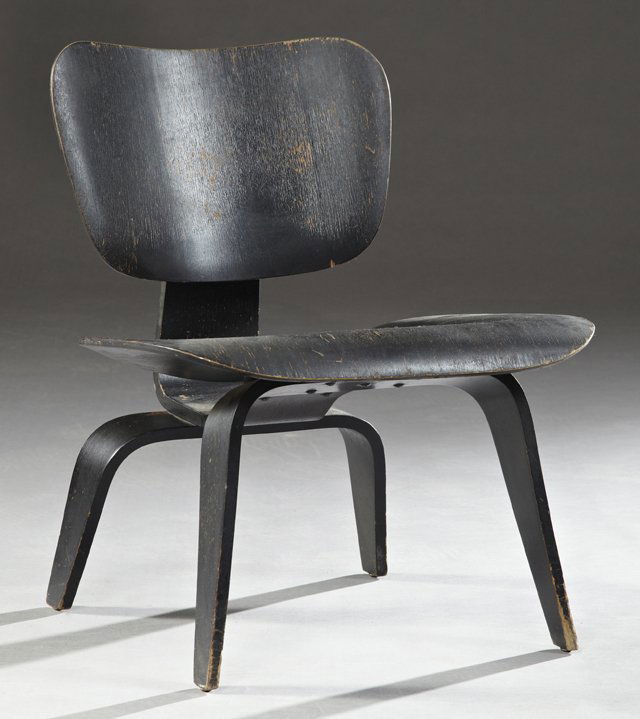 Charles Eames Molded Mahogany Plywood Chair, mid 20th: Charles Eames Molded Mahogany Plywood Chair, mid 20th c., by Evans Products Co. for Herman Miller, so labeled on the underside, now in black paint, H.- 26 1/2 in.