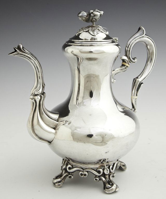 French First Standard Silver Coffee Pot, late 19th c.,: French First Standard Silver Coffee Pot, late 19th c., by Alphonse Debain, paris, the lid with a fruit form finial, the whole on a pierced base on four branch form feet, H.- 8 3/4 in., W.- 7 1/4 in.,
