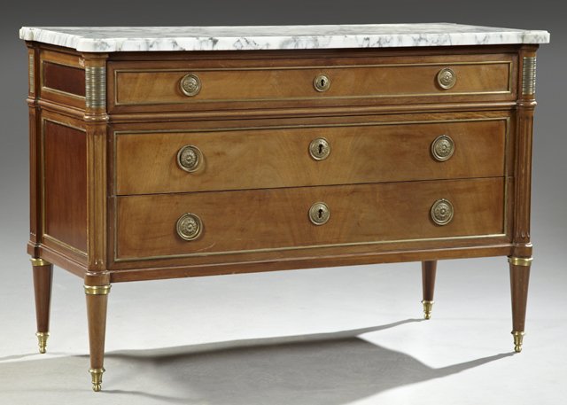 Louis XVI Style Ormolu Mounted Carved Mahogany Marble: Louis XVI Style Ormolu Mounted Carved Mahogany Marble Top Chest, early 20th c., the ogee edge highly figured white cookie corner marble over a bronze mounted frieze drawer and two bronze mounted lower