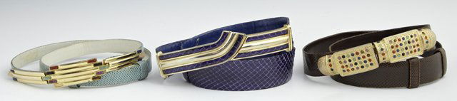 Group of Three Vintage Judith Leiber Leather Belts,: Group of Three Vintage Judith Leiber Leather Belts, consisting of a chocolate brown lizard example with a Byzantine style gold buckle studded with semi-precious stoned including topaz and jade; a purp
