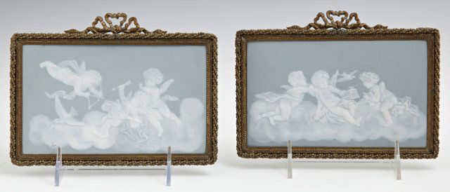 Pair of Limoges Pat-Sur-Pate Porcelain Plaques, early: Pair of Limoges Pat-Sur-Pate Porcelain Plaques, early 20th c., by Camille Tharaud, depicting putti in clouds, presented in period Louis XV style brass frames with ribbon bow and garland surmounts, H.-