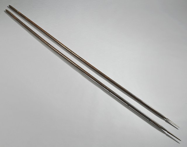 Pair of Wrought Iron and Wood Pikes, 19th c., double: Pair of Wrought Iron and Wood Pikes, 19th c., double ended, of tapered form, H.- 111 1/2 in., Dia.- 1 1/4 in.