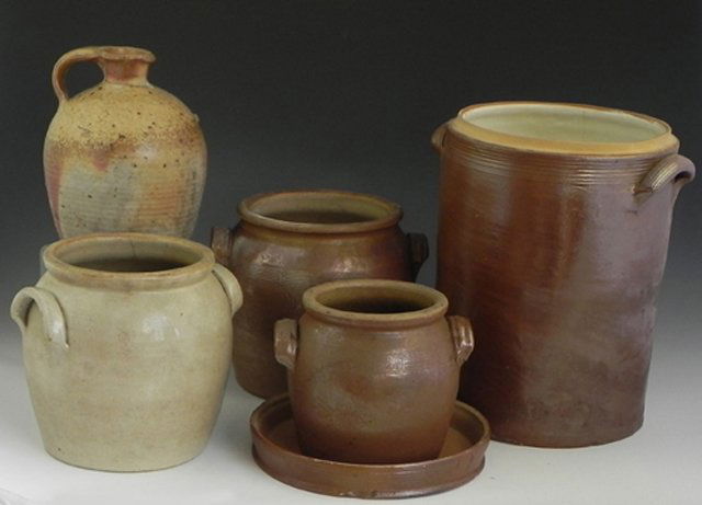 Group of Five French Provincial Earthenware Pots, 19th: Group of Five French Provincial Earthenware Pots, 19th c., three ring handled crocks, a ring handled lidded cylindrical crock, and a handled jug. (5 Pcs.)