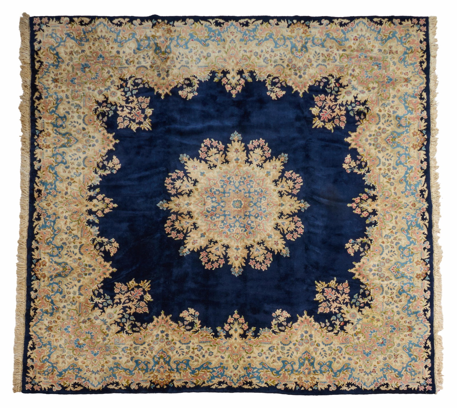 Persian Kerman Carpet, 9' x 10'.: Persian Kerman Carpet, intricate floral medallion design, on a deep blue field, 9' x 10'. Provenance: The Estate of Joseph A. Jaeger, Jr., New Orleans, LA.