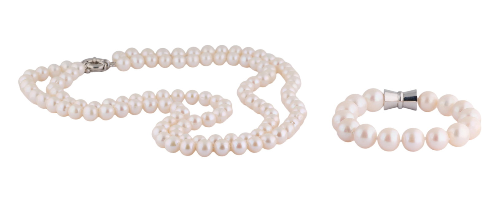 Two-Piece Set of White Cultured Pearls, Strand- L.- 19 in.; Bracelet- L.- 8 1/2 in. (2 Pcs.): Two-Piece Set of White Cultured Pearls, consisting of a double strand of princess length 8mm white cultured pearls, with a jumbo spring ring clasp; together with a bracelet composed of 15 white freshw