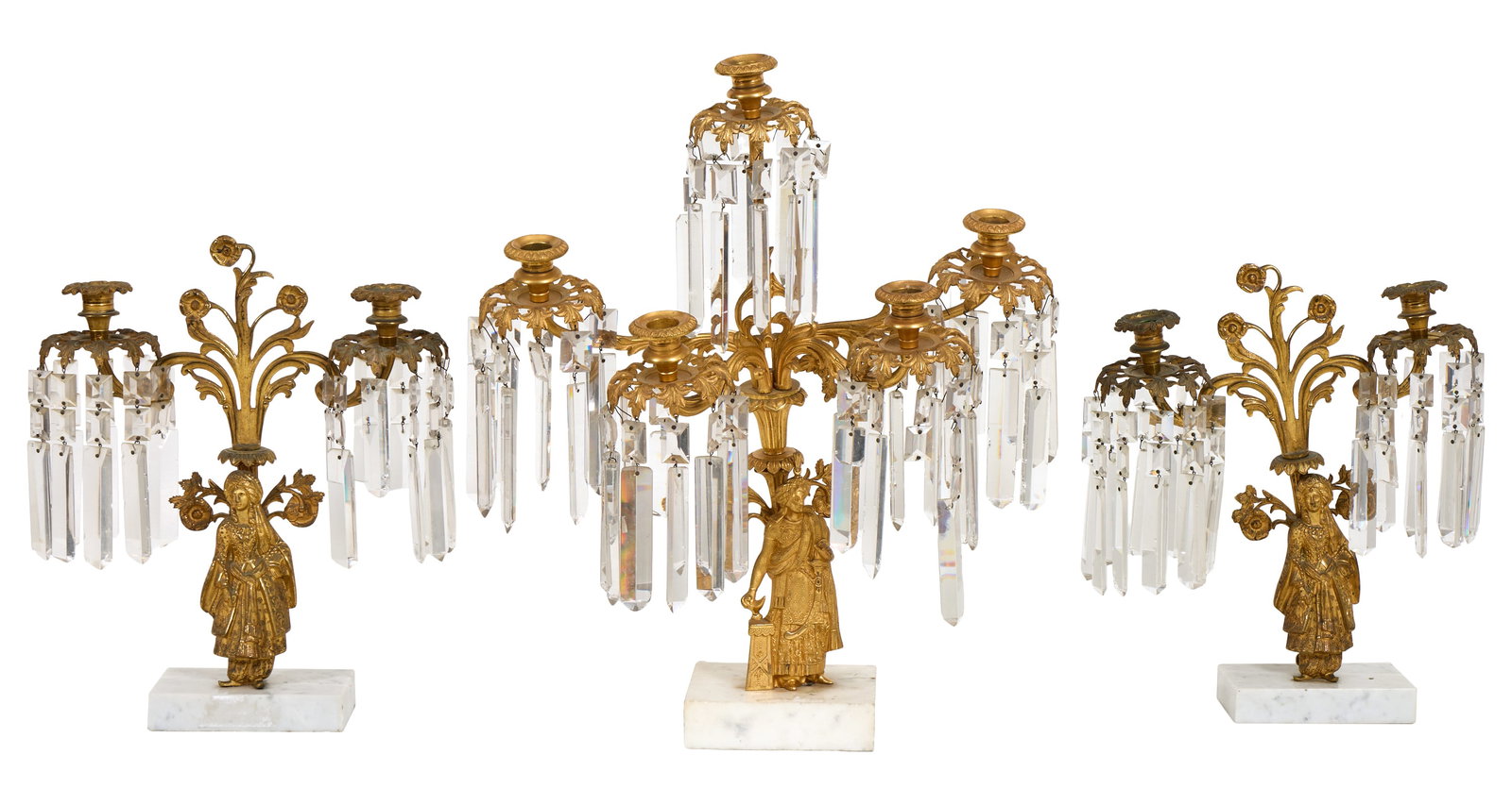 Triple Set of Gilt Brass Crystal Hung Girandoles, mid 19th c., Larger- H.- 22 in., W.- 19 in., D.- 6: Triple Set of Gilt Brass Crystal Hung Girandoles, mid 19th c., consisting of one four arm example and two side arms, all with draped female figures, coffer prisms, on white marble bases, Larger- H.- 2