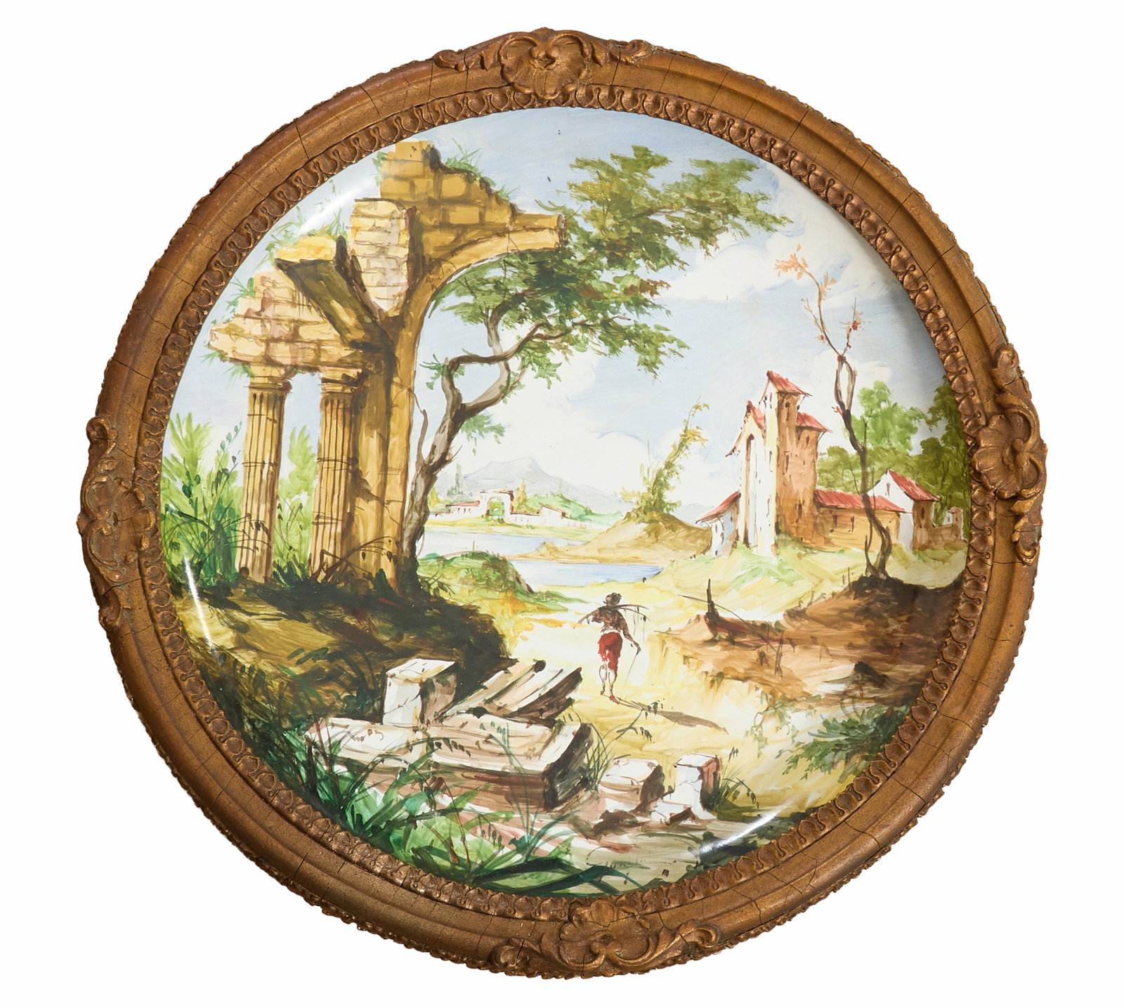 Very Large Italian Hand-Painted Circular Porcelain Plaque, 19th c., H.- 2 3/4 in.. Dia.- 21 1/2 in.: Very Large Italian Hand-Painted Circular Porcelain Plaque, 19th c., of a landscape with a ruin, a chalet, and a fisherman, faintly signed, marked with a rooster & Italy en verso, presented in a gilt a