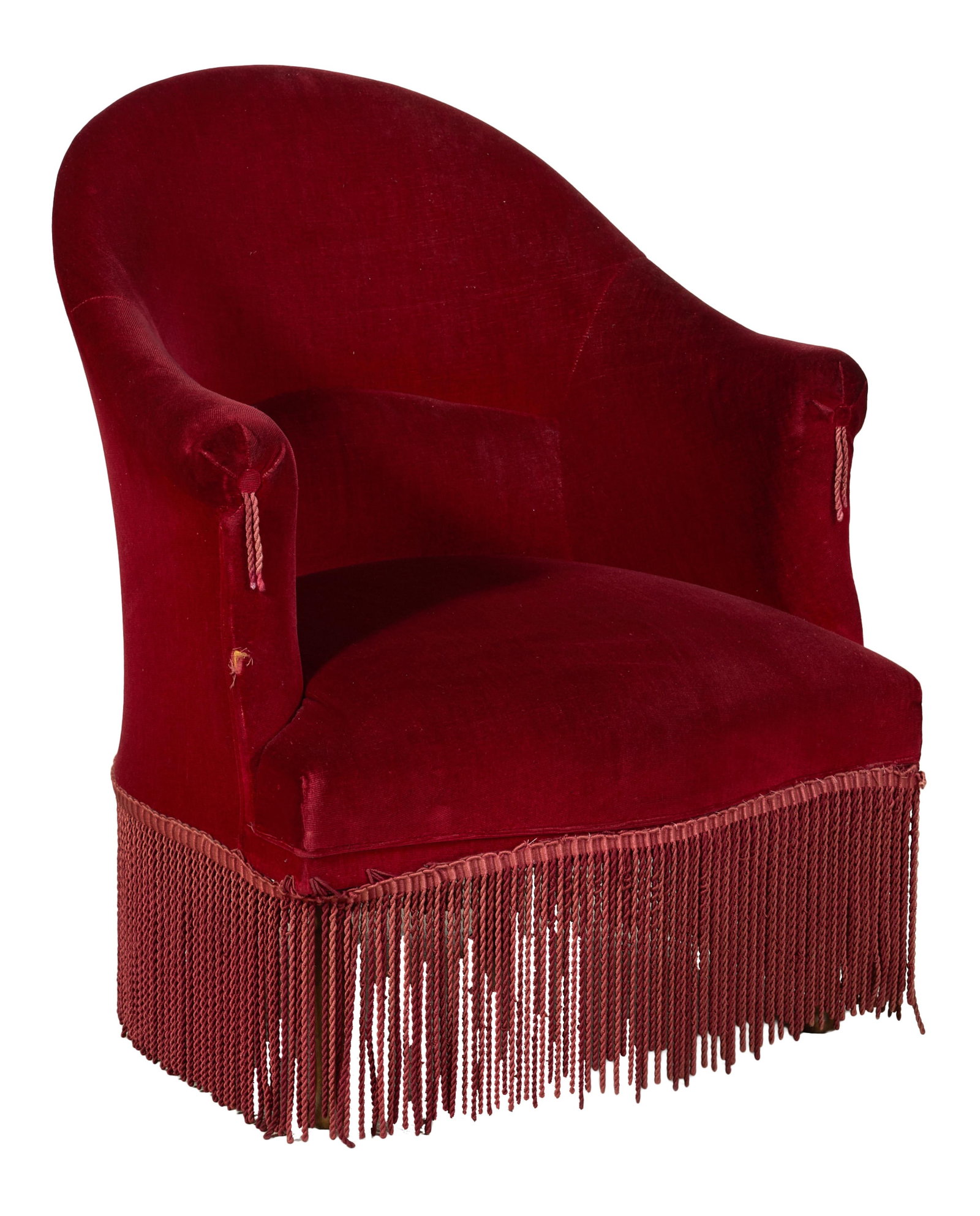 French Napoleon III Berger, late 19th c., H.- 30 1/2 in., W.- 26 in., D.- 26 in.: French Napoleon III Berger, late 19th c., the fully upholstered piece with arched back into padded arms, bullion fringe, red velvet upholstery, H.- 30 1/2 in., W.- 26 in., D.- 26 in.