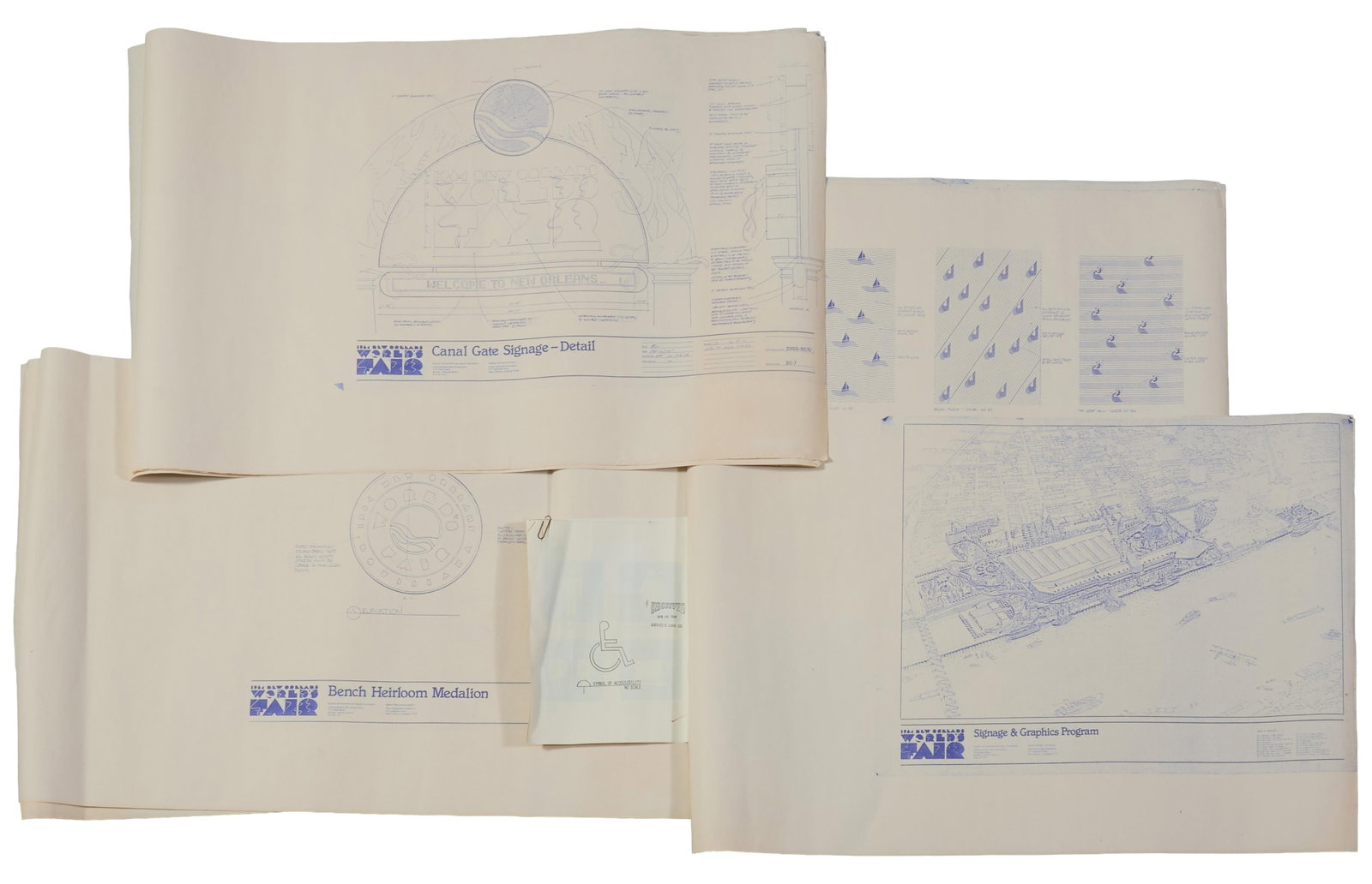 Blueprint Copies for the World's Fair, New Orleans, 1984, Sheet Plans- H.- 22 in., W.- 34 in.,: Blueprint Copies for the World's Fair, New Orleans, 1984, consisting of seventeen sheet plans of information and regulation signage that include gateway entrances and locations; together with a smalle