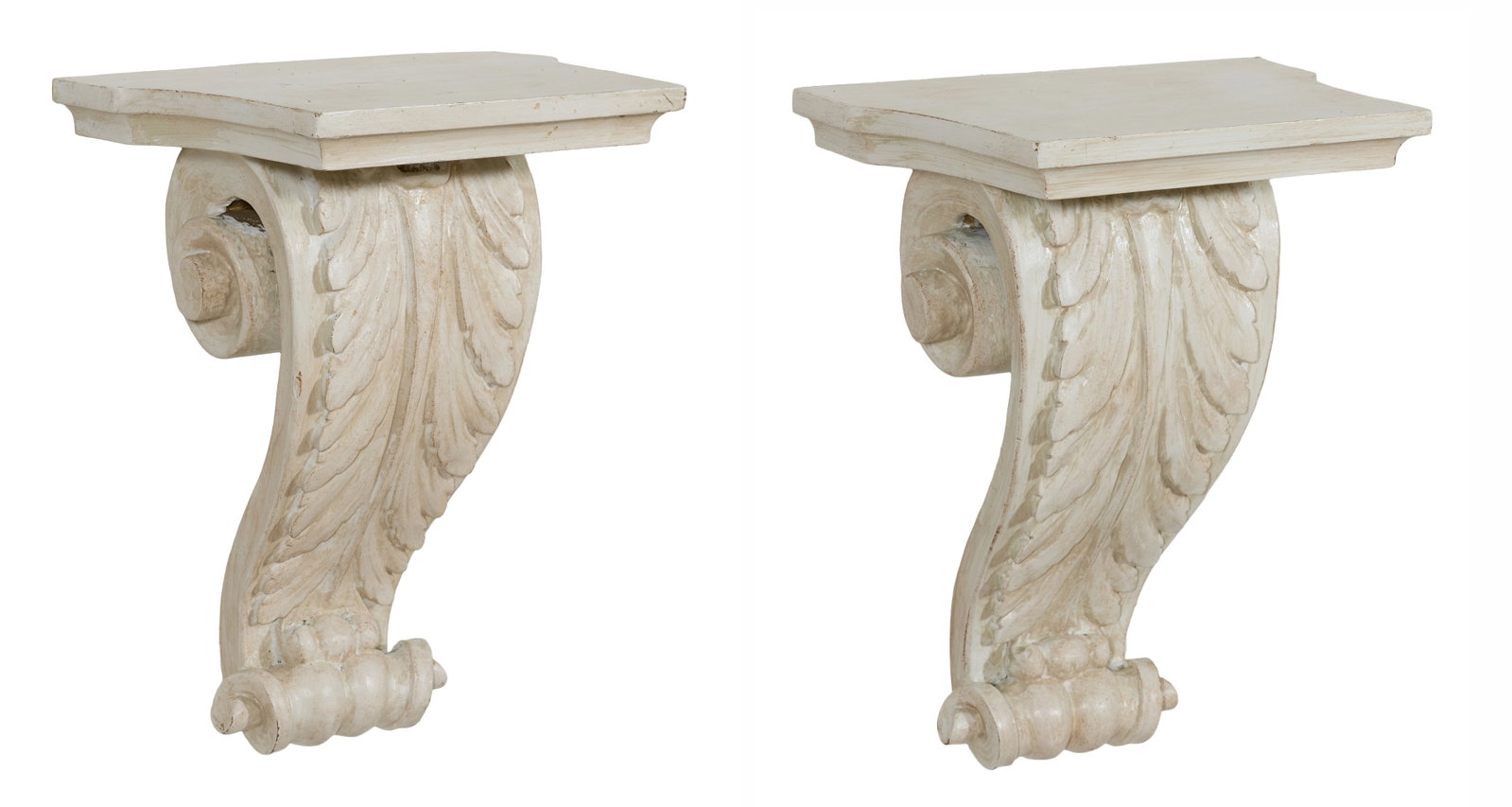 Pair of Classical Style Creme Peinte Scroll Wall Brackets, 21st c., Each- H.- 13 7/8 in., W.- 10 7/8: Pair of Classical Style Creme Peinte Scroll Wall Brackets, 21st c., the shaped moulded tops over volute scroll acanthus brackets, Each- H.- 13 7/8 in., W.- 10 7/8 in., D.- 7 1/2 in. (2 Pcs.) Provenanc