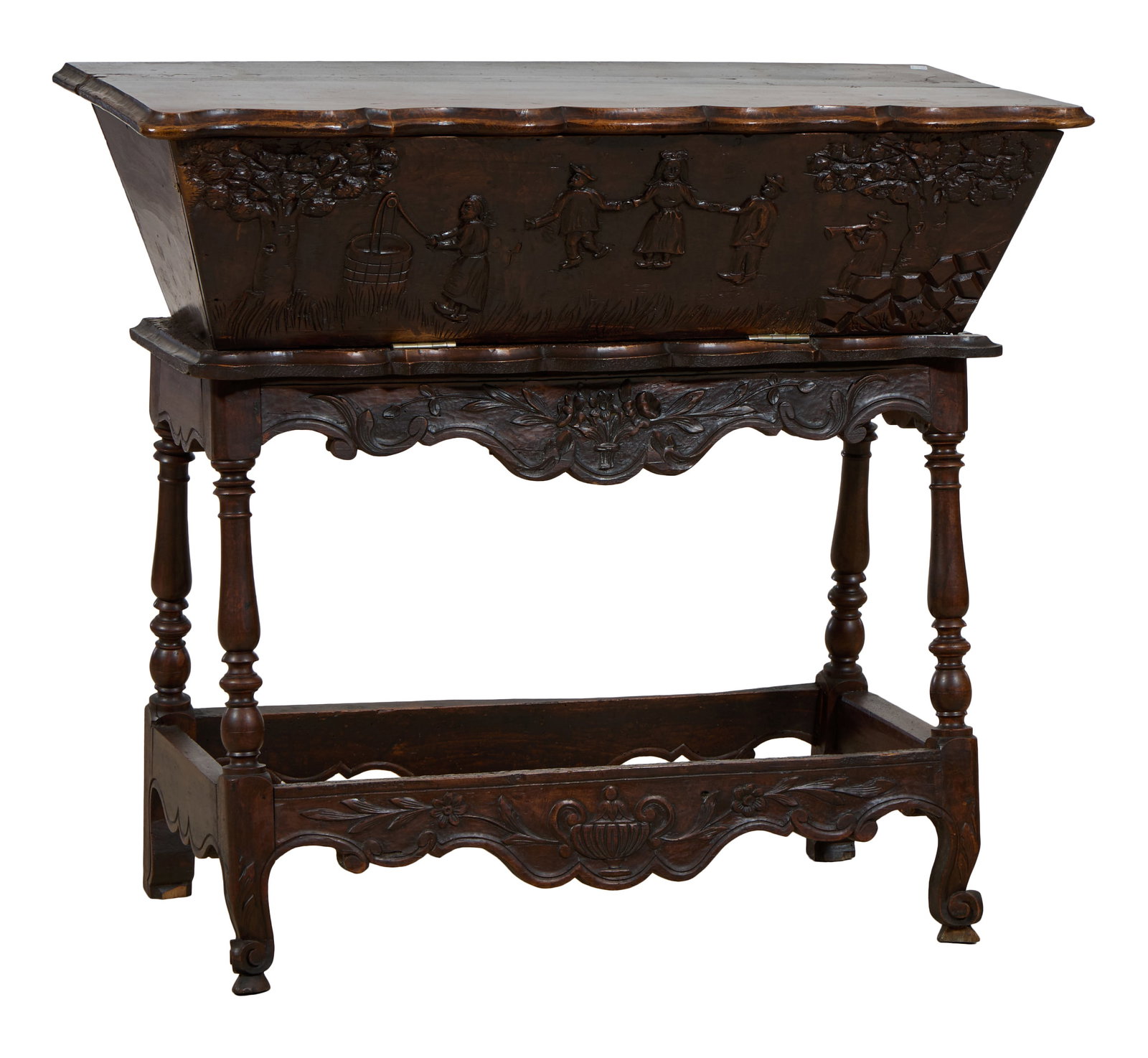 French Provincial Petrin, mid/late 19th c., H.- 37 1/2 in., W.- 42 in., D.- 18 in.: French Provincial Petrin, mid/late 19th c., the moulded shaped top over carved fall front opening to reveal a storage container, attached table form base with carved apron, turned legs, highly carved 