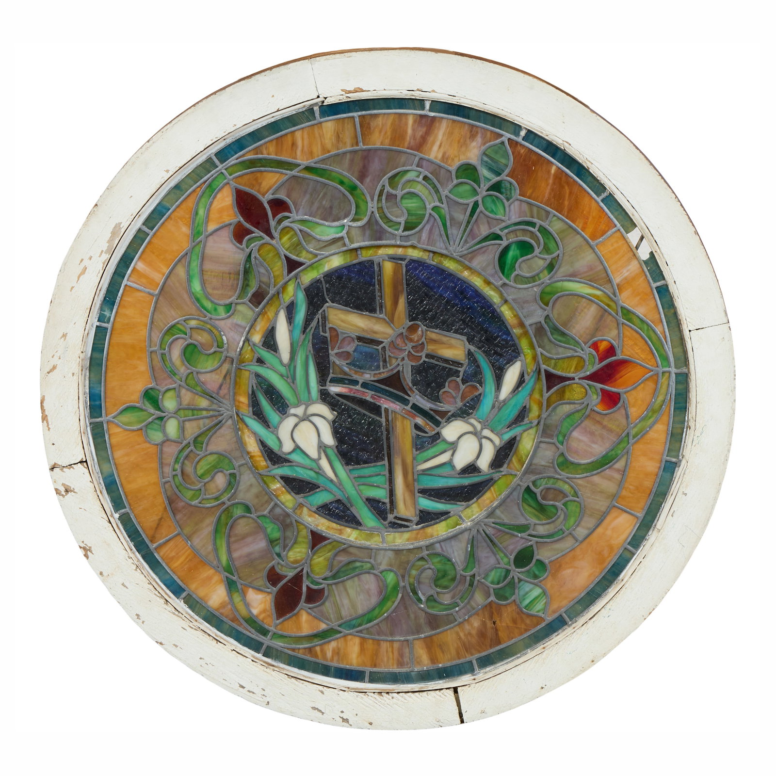 Circular Art Nouveau Stained Glass Church Window, early 20th c., Dia.- 36 in., D.- 1 5/8 in.: Circular Art Nouveau Stained Glass Church Window, early 20th c., with central cross and crown motif flanked by white lilies against a cobalt field, within a stylized floriate fleur-de-lis surround, pr