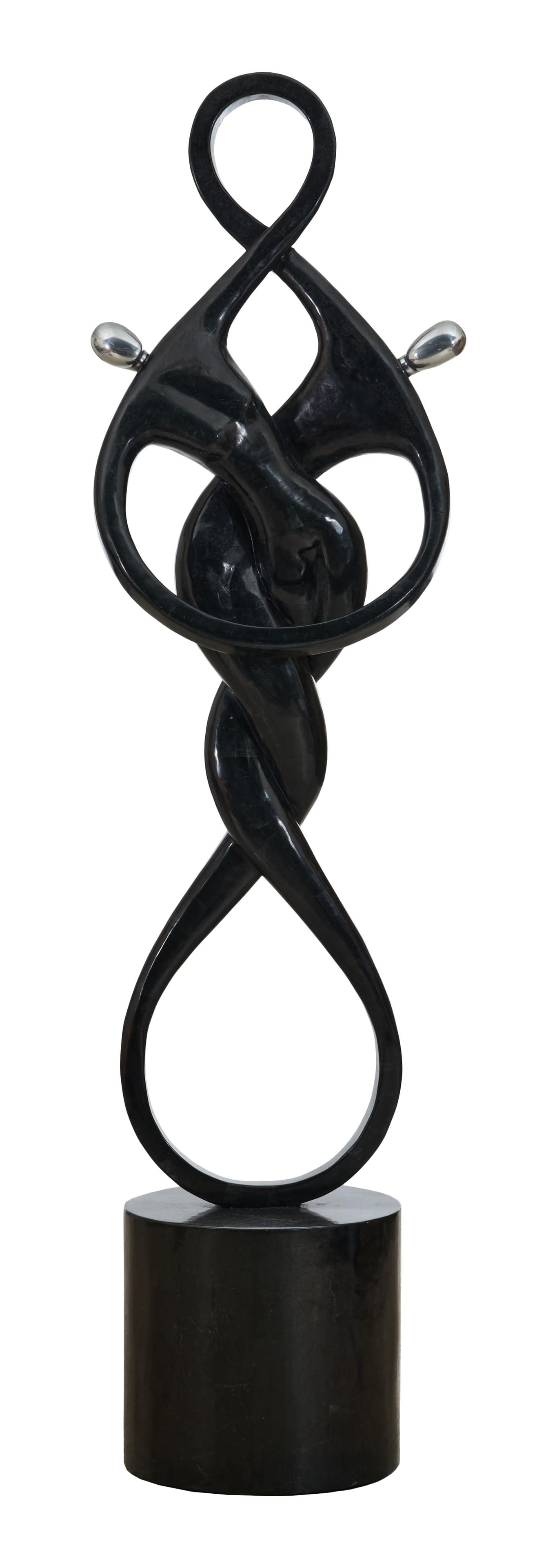 Large Art Deco Sculpture, 20th c., Overall- H.- 81 1/2 in., W.- 20 in., D.- 16 in.: Large Art Deco Sculpture, 20th c., of intertwined figures, black and chrome resin on conforming pedestal, Overall- H.- 81 1/2 in., W.- 20 in., D.- 16 in. Provenance: The Estate of Joseph A. Jaeger, Jr