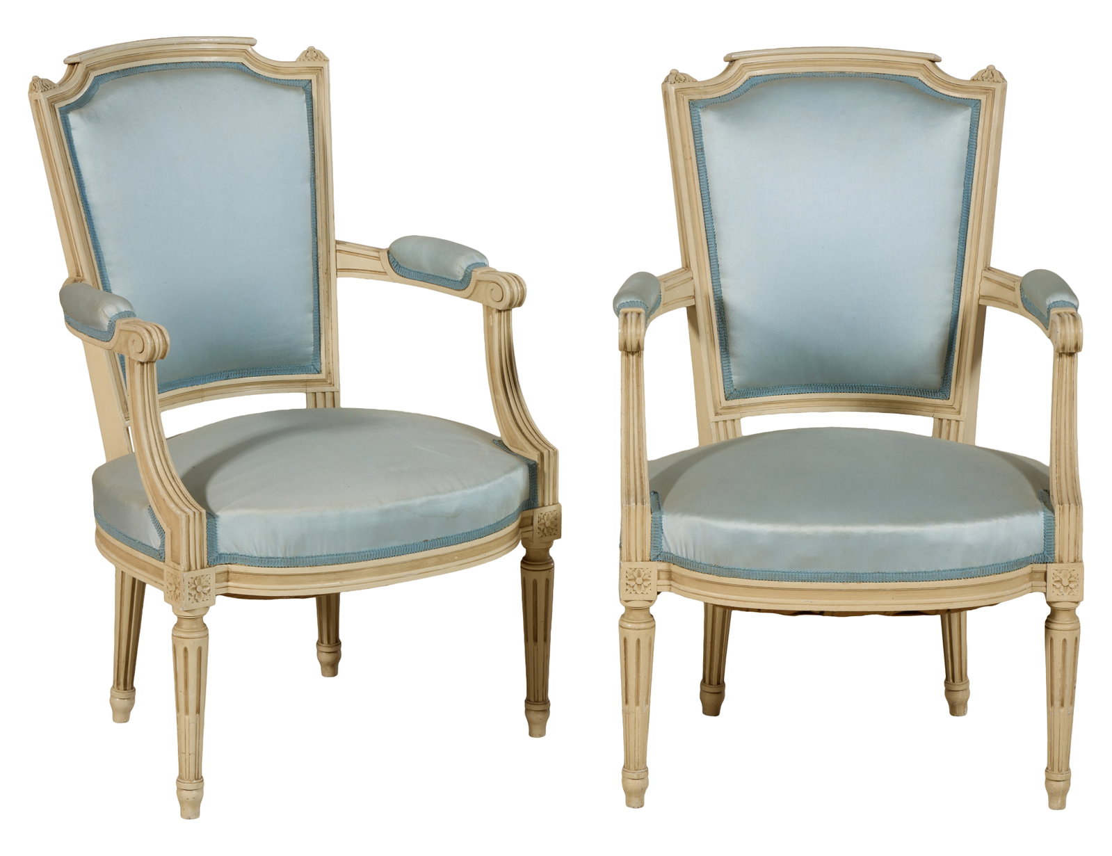 Pair of Louis XVI Style Creme Peinte Fauteuils, mid 20th c., Each- H.- 36 in., W.- 24 in., D.- 25: Pair of Louis XVI Style Creme Peinte Fauteuils, mid 20th c., the upholstered shield backs into padded scrolled arms, serpentine seat rail joining rosette blocks over spool turned fluted stop-fluted ta