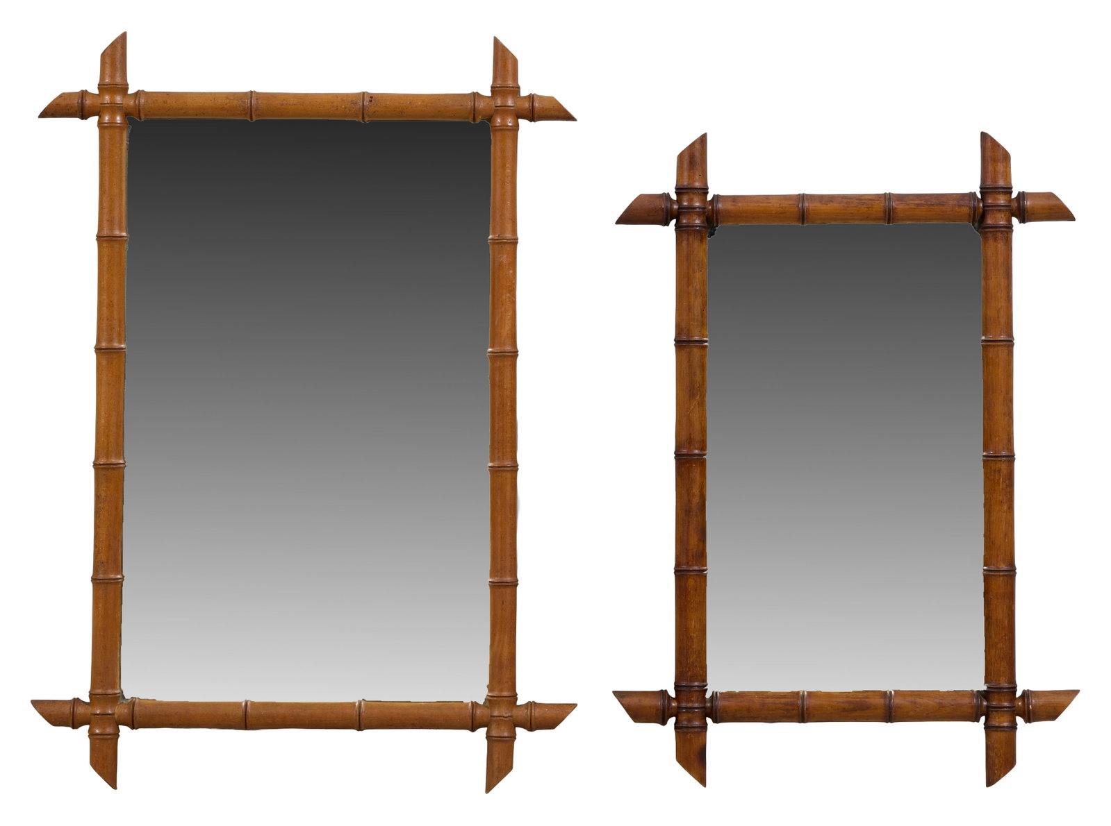 Two English Faux Bamboo Mirrors, late 19th c., Larger- H.- 33 in., W.- 23 3/4 in., D.- 1 3/8 in. (2: Two English Faux Bamboo Mirrors, late 19th c., the segmented surround with opposing angular cut extended ends, Larger- H.- 33 in., W.- 23 3/4 in., D.- 1 3/8 in. (2 Pcs.)
