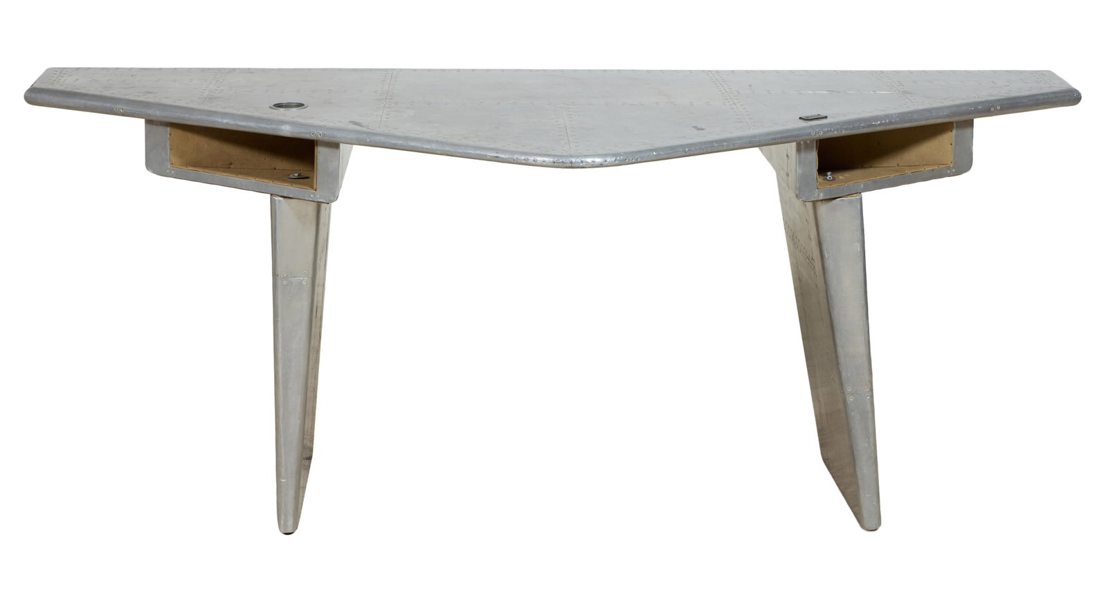Rockson's Aluminum Clad Aviator Desk, late 20th c., H.- 30 7/8 in., W.- 79 1/2 in., D.- 35 1/2 in.: Rockson's Aluminum Clad Aviator Desk, late 20th c., of wing form with two open compartments, wing form legs, all clad in aluminum sheeting, labeled, H.- 30 7/8 in., W.- 79 1/2 in., D.- 35 1/2 in.