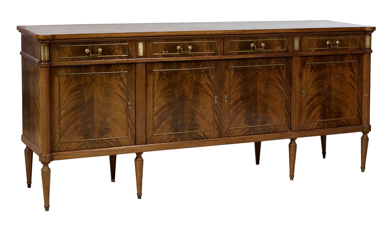 French Louis XVI Style Crotch Walnut Enfilade, late 20th c., H.- 41 1/4 in., W.- 94 in., D.- 21 1/2: French Louis XVI Style Crotch Walnut Enfilade, late 20th c., the rectangular top with turret corners, four frieze drawers, over four crotch walnut doors, fluted pilasters, flanked by fluted columnar s
