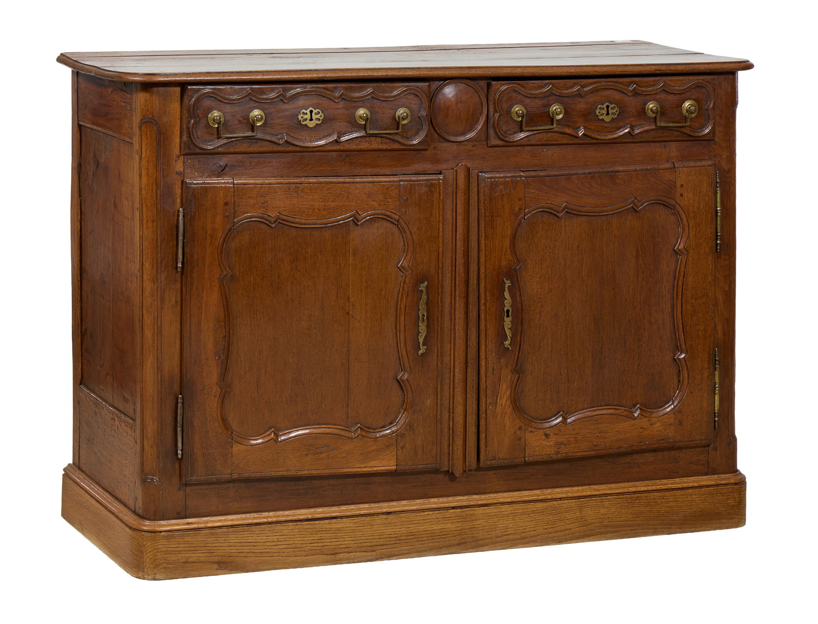 French Louis XIV Style Walnut Sideboard, late 19th c., H.- 40 3/8 in., W.- 57 in., D.- 20 1/4 in.: French Louis XIV Style Walnut Sideboard, late 19th c., the moulded rectangular top with rounded corners, two frieze drawers with central rondelle. two lower cabinet doors, moulded base, H.- 40 3/8 in.