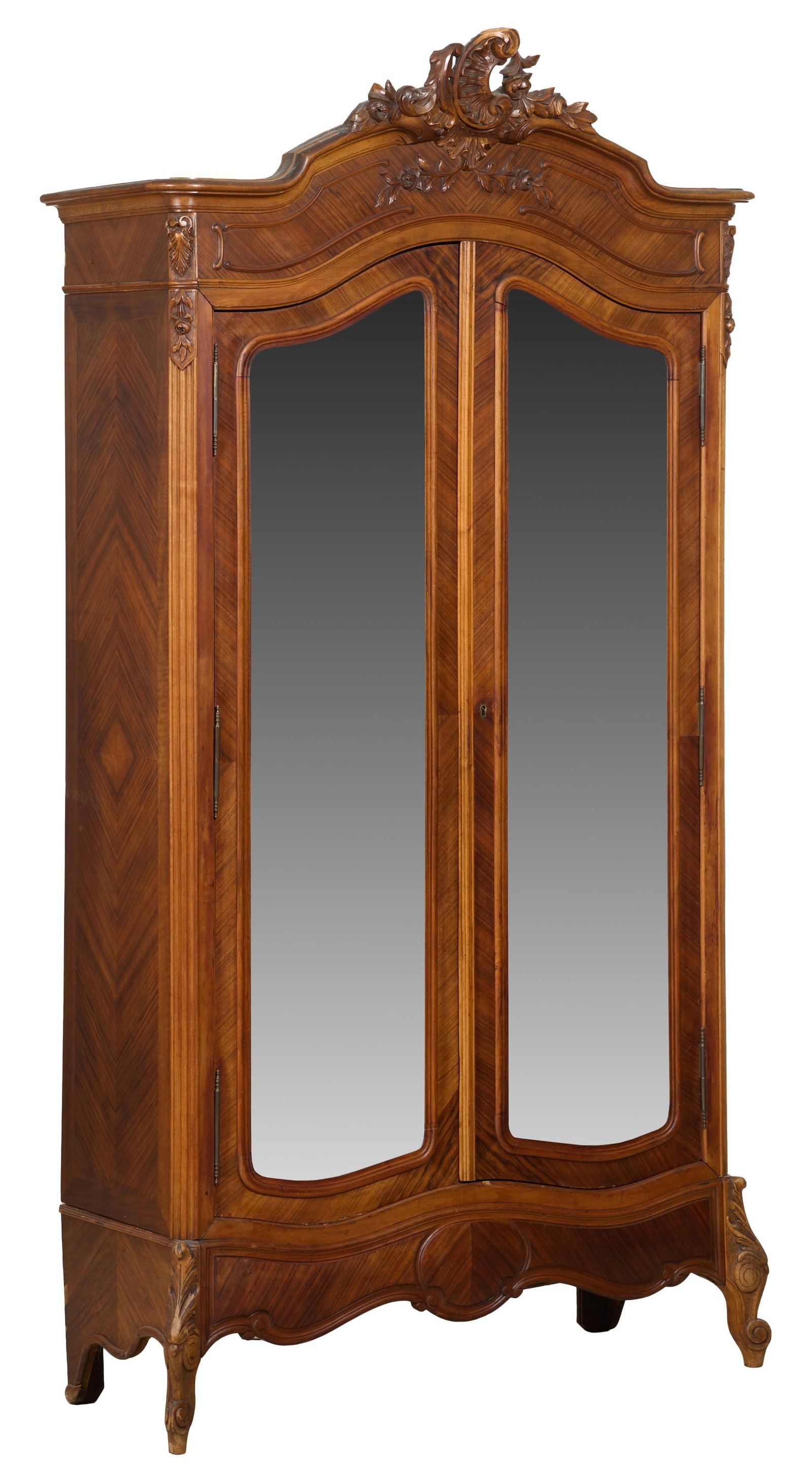 French Louis XV Style Parquetry Walnut Armoire, early/mid 20th c., H.- 95 1/2 in., W.- 49 in., D.-: French Louis XV Style Parquetry Walnut Armoire, early/mid 20th c., the arched pierced rocaille crest with floral and foliate carving, two mirrored doors, foliate fluted stiles, scrolled apron joining 