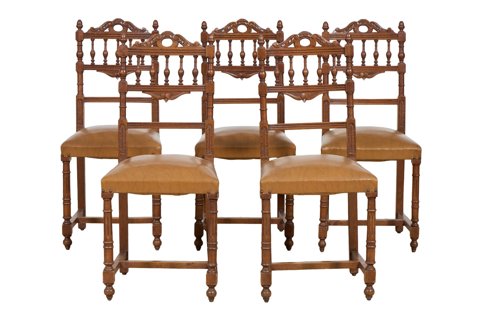 Set of Five French Henry II Style Carved Walnut Dining Chairs, mid 20th c., Each- H.- 36 1/2 in.,: Set of Five French Henry II Style Carved Walnut Dining Chairs, mid 20th c., the pierced arched crest over balustrade, finialed stiles, trapezoidal seat, ring turned flute legs into 'H' stretchered blo
