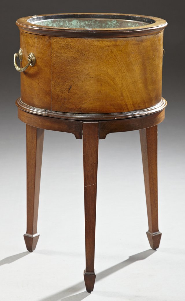 Sheraton Style Carved Mahogany Wine Cooler, early 20th: Sheraton Style Carved Mahogany Wine Cooler, early 20th c., with brass handles and a copper liner, on square tapering legs to spade feet, H.- 25 1/4 in., Dia.- 15 in.