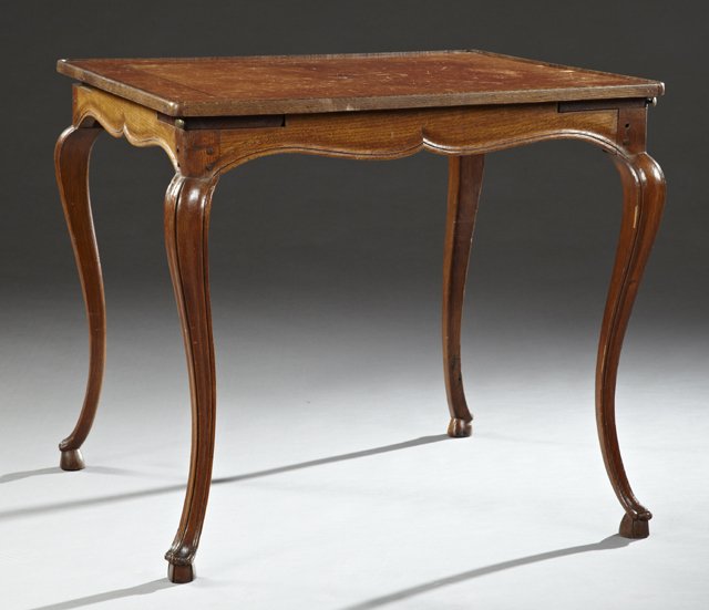 French Carved Oak Card Table, early 20th c., with a: French Carved Oak Card Table, early 20th c., with a dished top with tooled leather insert, each corner with pullout drink slides, over shaped skirts, on reeded cabriole legs on hoof feet, H.- 28 in., 