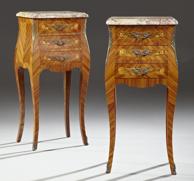 Pair of Louis XV Style Inlaid and Crotched Ormolu: Pair of Louis XV Style Inlaid and Crotched Ormolu Mounted Kingwood Bombe Marble Top Nightstands, 20th c., the shaped rounded edge highly figured ochre marble over three marquetry inlaid drawers, flank