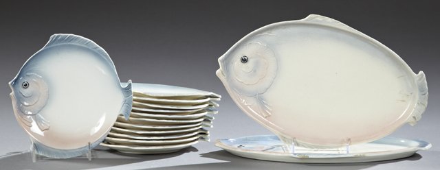 Czechoslovakian Fourteen Piece Ceramic Fish Set, 20th: Czechoslovakian Fourteen Piece Ceramic Fish Set, 20th c., consisting of twelve fish form plates and two matching serving platters. (14 Pcs.)
