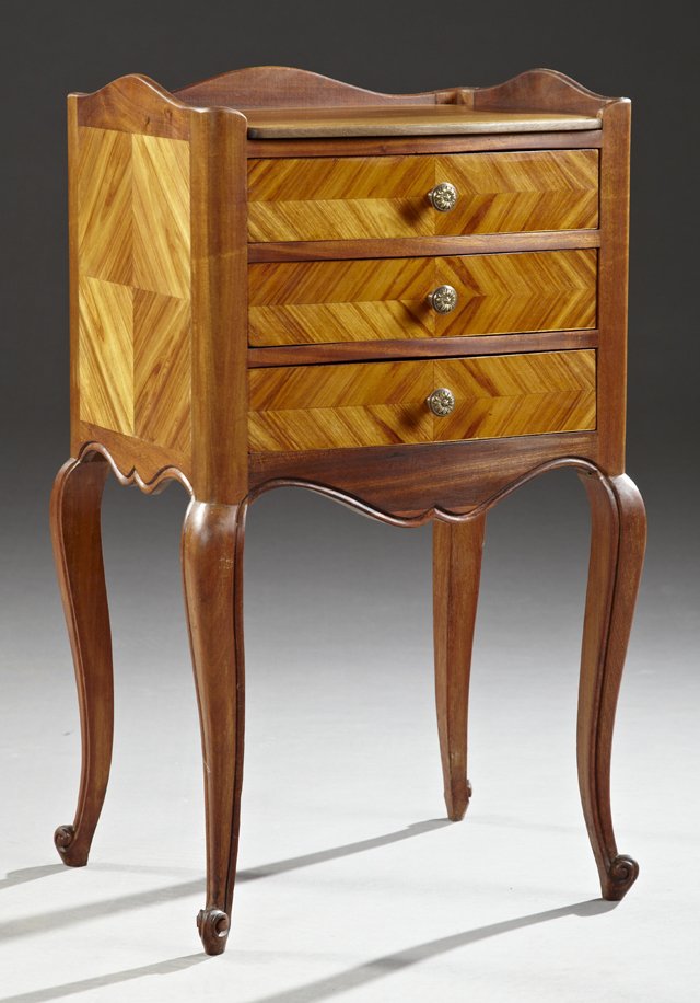 Louis XV Style Mahogany and Kingwood Bow Front: Louis XV Style Mahogany and Kingwood Bow Front Nightstand, early 20th c., the 3/4 galleried top over three crotched frieze drawers, on reeded cabriole legs to scrolled toes, H.- 28 1/4 in., W.- 16 3/4