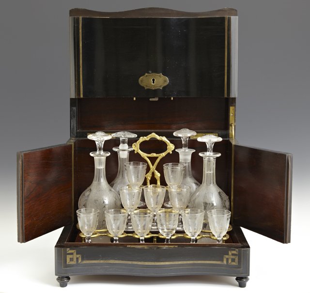 French Brass Inlaid Ebonized Cave a Liqueur, c. 1870,: French Brass Inlaid Ebonized Cave a Liqueur, c. 1870, the interior with a lift out tray fitted for four etched glass decanters and sixteen etched glass liqueur glasses (one lacking), H.- 10 1/2 in., W