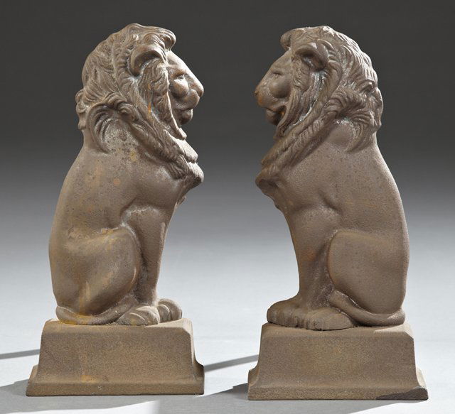 Pair of Cast Iron Lion Form Andirons, 19th c., on: Pair of Cast Iron Lion Form Andirons, 19th c., on sloping stepped bases, H.- 15 in., W.- 7 1/4 in., D.- 14 1/2 in.
