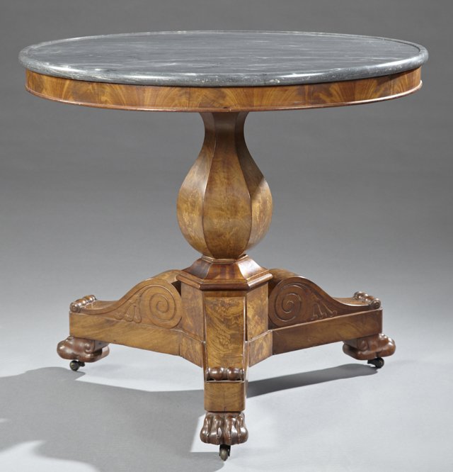 French Carved Mahogany Circular Marble Top Center: French Carved Mahogany Circular Marble Top Center Table, 19th c., the dished highly figured grey marble on a hexagonal vasiform support to a tripartite base on paw feet, H.- 28 1/4 in., Dia.- 32 in.
