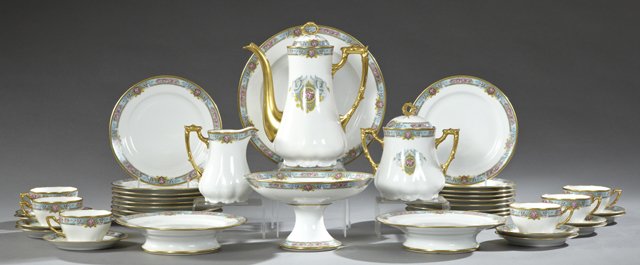 Forty-Two Piece Partial Set of Limoges Porcelain: Forty-Two Piece Partial Set of Limoges Porcelain Dinnerware, early 20th c., maker's mark of PP, with gilt and polychrome transfer banding of flowers and swans, consisting of 18 cake plates, 6 cups, 11