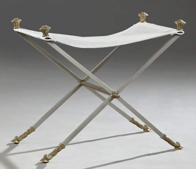 Empire Style Steel and Brass Vanity Stool, 20th c., of: Empire Style Steel and Brass Vanity Stool, 20th c., of x-form, with a faux crocodile seat, the whole on brass hoof feet, H.- 18 1/2 in., W.- 22 in., D.- 13 1/2 in.