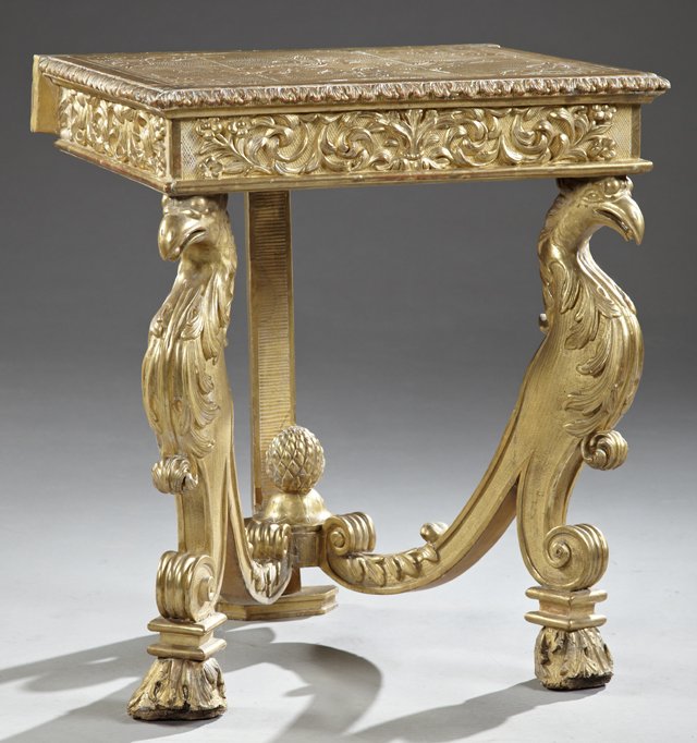 Unusual Continental Carved Gilt Wood Gold Leaf Console: Unusual Continental Carved Gilt Wood Gold Leaf Console Table, late 19th/early 20th c., the top with incised leaf carving, over a skirt with relief leaves and flowers, on two large carved eagle support