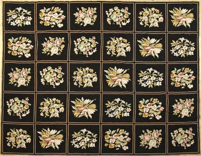 Aubusson Style Needlepoint Carpet, 20th c., with floral: Aubusson Style Needlepoint Carpet, 20th c., with floral decoration on a black ground, 9' x 12'.