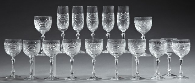 Group of Seventeen Crystal Wine Glasses, 20th c., by: Group of Seventeen Crystal Wine Glasses, 20th c., by Cristalleries DeLorraine, consisting of twelve red wines and five champagne flutes, unused, in original boxes. (17 Pcs.)
