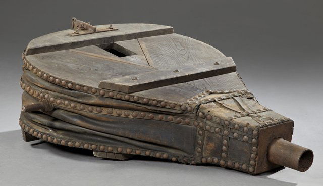 Large French Provincial Carved Wood and Iron Forge: Large French Provincial Carved Wood and Iron Forge Bellows, 19th c., with iron nails and leather strapping, H.- 56 in., W.- 35 1/2 in., D.- 13 in.