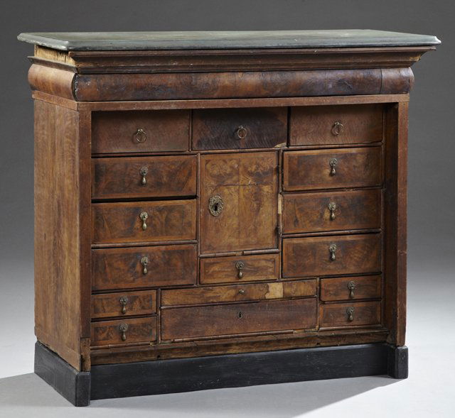 Unusual Carved Walnut Granite Top Chest, late 19th c.,: Unusual Carved Walnut Granite Top Chest, late 19th c., with a top convex frieze drawer over an interior fitted with drawers and cupboards, on a later plinth base, H.- 38 1/2 in., W.- 44 in., D.- 19 in