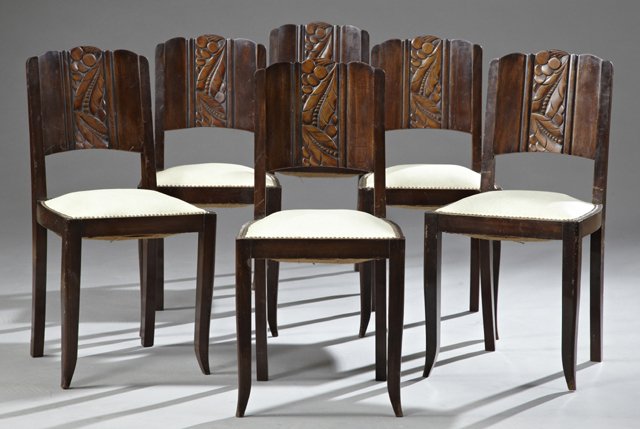 Set of Six Art Deco Carved Mahogany Dining Chairs, c.: Set of Six Art Deco Carved Mahogany Dining Chairs, c. 1940, the backs with central fruit and leaf carved bands, with brass tack vinyl upholstery on splayed legs, H.- 33 in.,