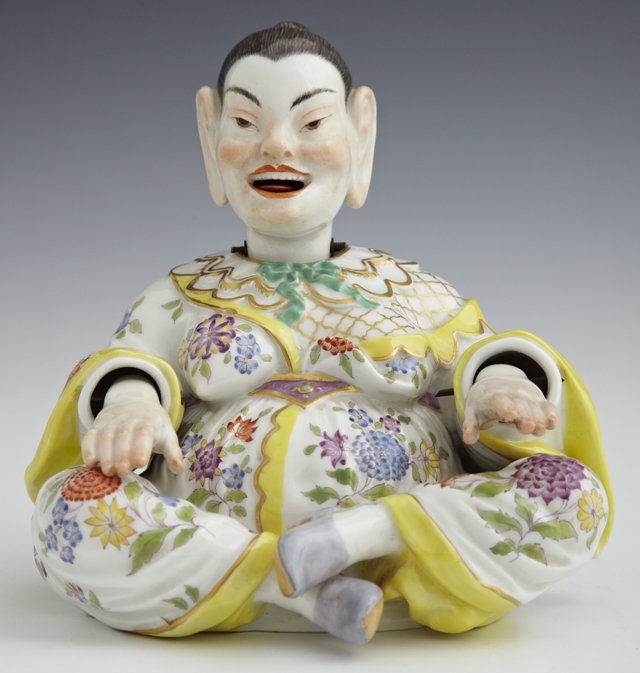 Meissen Porcelain Mandarin Nodder, 19th c., with moving: Meissen Porcelain Mandarin Nodder, 19th c., with moving hands, head and tongue, with gilt and polychromed decoration, the blue crossed swords mark verso, H.- 6 1/2" W.- 6 1/4 in., D.- 6 in.