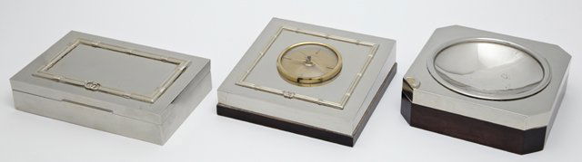 Three Piece Gucci Silverplated Desk Set, 20th c.,: Three Piece Gucci Silverplated Desk Set, 20th c., consisting of a cigarette box, ashtray and desk clock, each marked "Gucci," Clock- H.- 5 3/4 in., W.- 6 in., D.- 1 3/4 in. (3 Pcs.)
