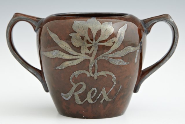 Mardi Gras Ball Favor, Rex, 1915, in the form of a: Mardi Gras Ball Favor, Rex, 1915, in the form of a silver depose brown handled sugar bowl, H.- 3 1/2 in., W.- 6 in., D.- 3 3/4 in.
