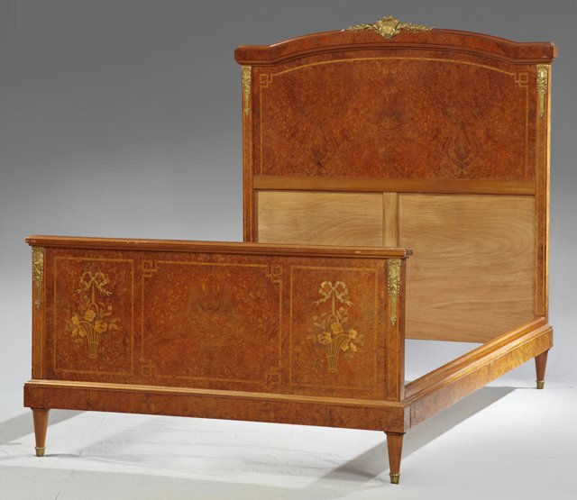 Louis XVI Style Inlaid Ormolu Mounted Burled Walnut: Louis XVI Style Inlaid Ormolu Mounted Burled Walnut Bed, c. 1920, the arched headboard with a central ormolu mount, over an arched inlaid panel flanked by ormolu mounted stiles, the whole on tapered c