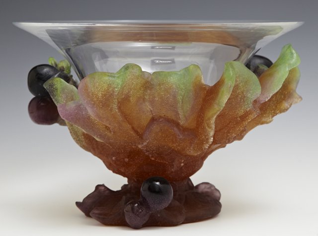 Daum Pate de Verre "Figs" Bowl, the clear bowl on a: Daum Pate de Verre "Figs" Bowl, the clear bowl on a frosted amber, lavender and green-edged foliate footed base scattered with deep plum figs, signed in script under the foot: "Daum France", with the 