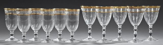 Set of Eleven Crystal Goblets, by Hookes, consisting of: Set of Eleven Crystal Goblets, by Hookes, consisting of a five large "Wedding Band" red wine goblets and a matching set of six iced water goblets, each with gold banding, all bearing the original prin