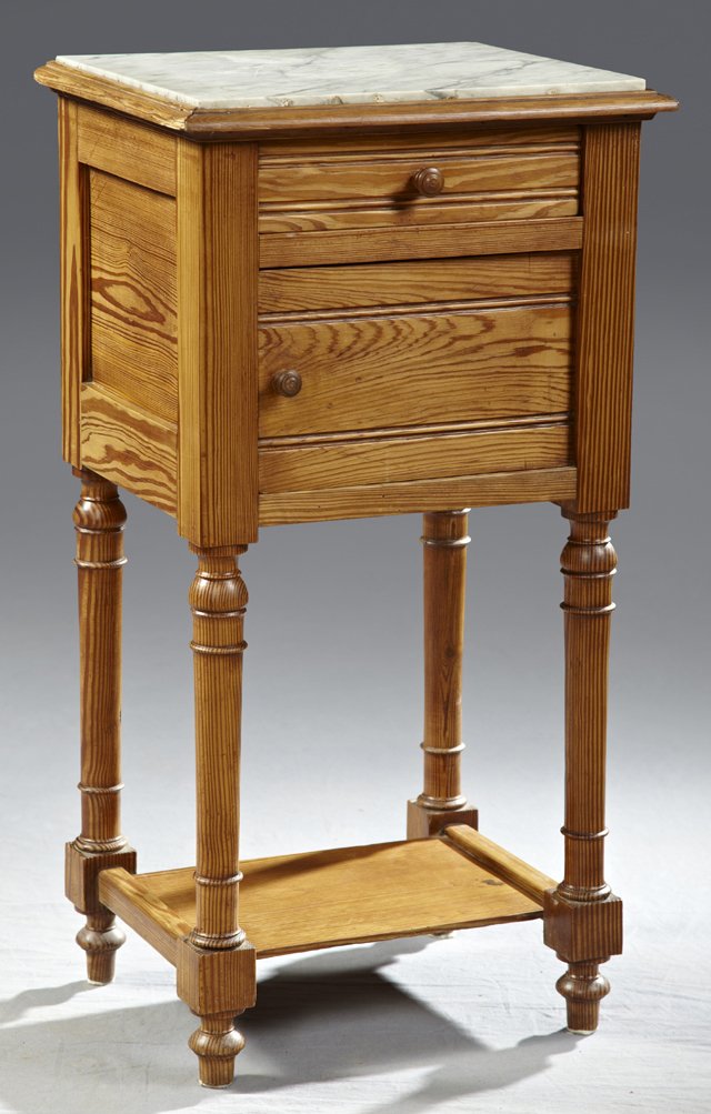 Louis Philippe Style Pitch Pine Marble Top Nightstand,: Louis Philippe Style Pitch Pine Marble Top Nightstand, c. 1880, the inset white marble over a frieze drawer and a lower cupboard, on turned supports to a lower stretcher-shelf, on turned toupie feet, 