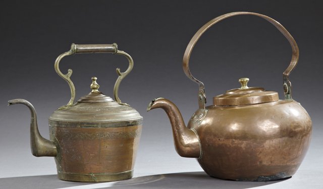 Group of Two Tea Kettles, one of hand hammered copper,: Group of Two Tea Kettles, one of hand hammered copper, late 19th c., the other of copper and brass, 20th c., with engraved decoration, Larger- H.- 8 in., W.- 14 3/4 in., D.- 11 1/2 in.